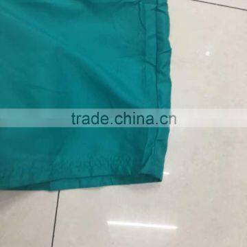 China Stocklots Men 100%polyester Pure Color Bermuda Shorts photo-2