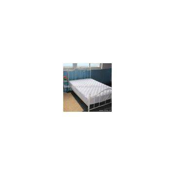 white microfibre mattress topper filled with polyester