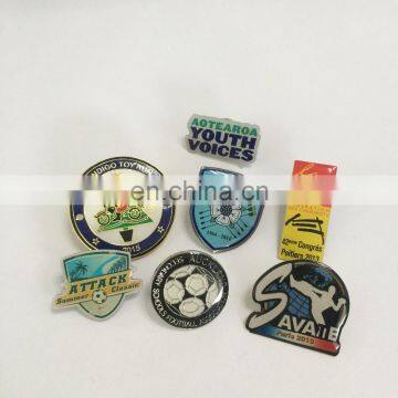 custom lapel pin with a butterfly clutch covered with resin in soft enamel or off-set made in round or rectangle or square shape