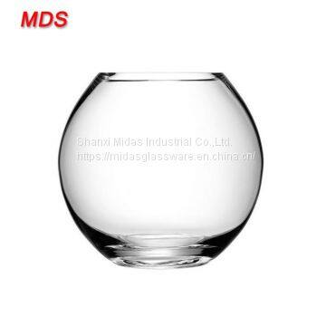 Round yellow small glass fish bowl vase for flowers