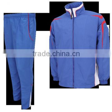 Tracksuit made of 100% Polyester Micro Fiber Royal Blue with Red and White Panels