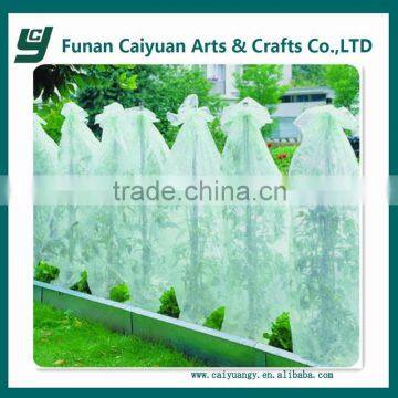 White plastic sheet greenhouse plant cover