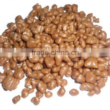 popping candy coated with chocolate