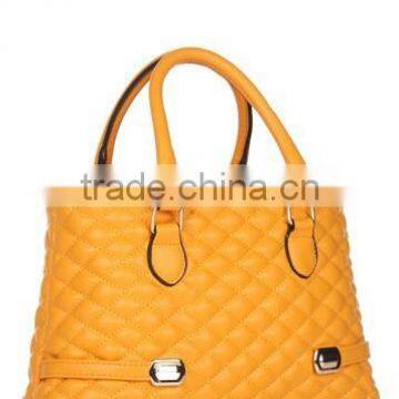 woman fashion handbag mustard color quilted handbag