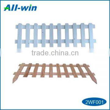 wooden garden fence, timber picket fence with extended spiked end sections