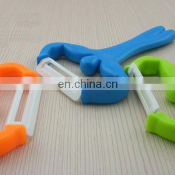 Promotional gift funny man design ceramics zester with plastic handle for peel cutting