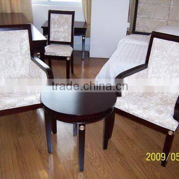 hotel bedroom chair with coffee table