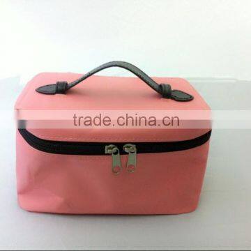 Double zipper pink colored cosmetic bag