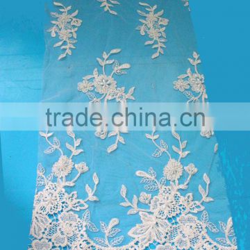 Made in China guangzhou hand cut swiss lace fabric in dubai