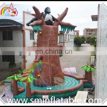 Promotion inflatable rock climbing wall,lawn tree shape rock climbing for sale