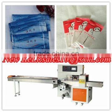 Disposable wipes flow wrapping machine