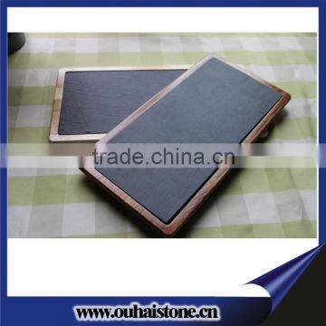 Decorative wooden serving board with slate stone inlay