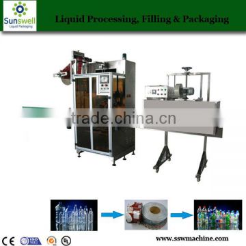 Automatic drink bottle label shrink labeling machine