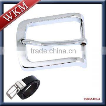 golden and silver colour metal buckle strap