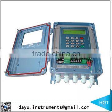 Remote reading ultrasonic flow meter transmitter with clamp on transducer