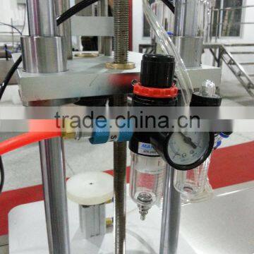 Desk Top Pneumatic Perfume Capping Machine photo-3