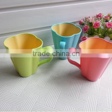 Flower shaped plastic cup with handle