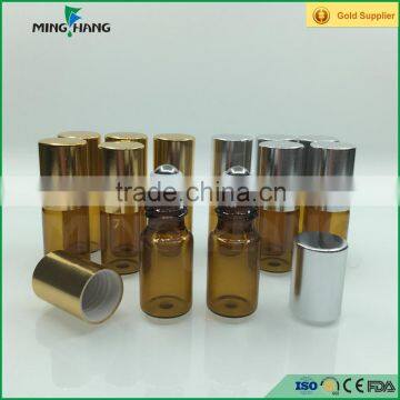 Amber tube glass bottle roll on glass bottle with steel roller ball