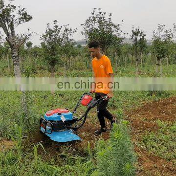 Engine driven tiller pallet handtruck stone burier garden cultivator waking trilar