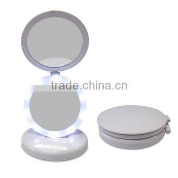 Plastic two way 5x magnifying compact travelling mirror with led light