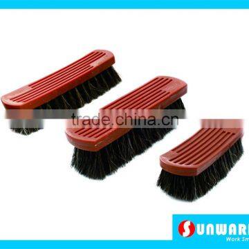 Handle cleaning brush with plastic block