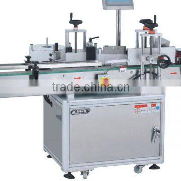 Automatic label sticking machine for round bottles
