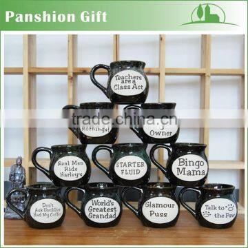 Black ceramic milk cup with various letters