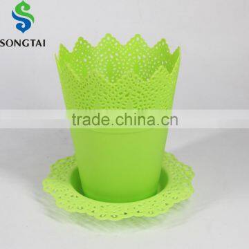 colourful round plastic flower pot with plate