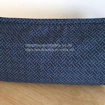 A multi pocket organizer bag in grey fabric for storage