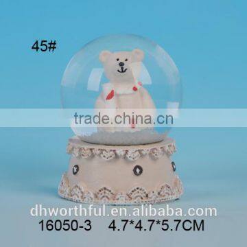 Resin custom made globe with bear figurine