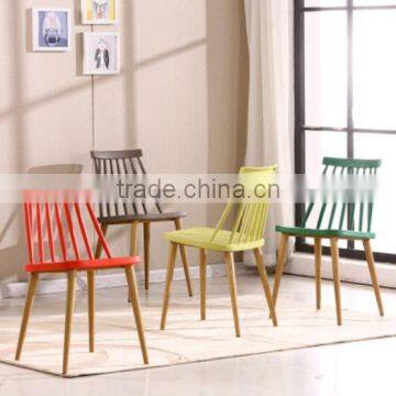 clear white stackable plastic chair with metal legs