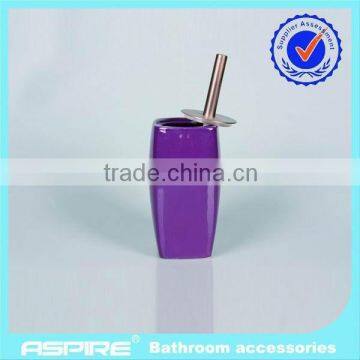 white ceramic toothbrush holder