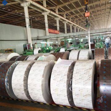 White and wood grain color coated aluminum strip for gutter system