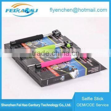Wireless extendable selfie stick with bluetooth shutter for wholesale