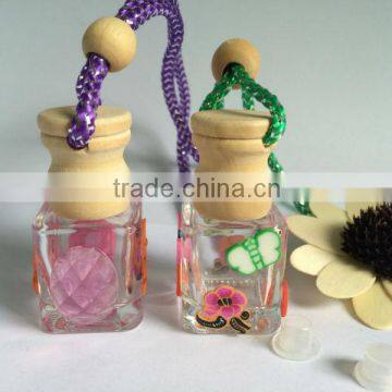 Hanging car perfume bottle