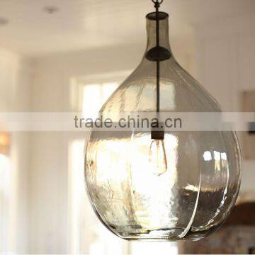 11.29-2 OVERSIZED GLASS PENDANT teardrop shape and mottled texture evoke an oversized wine jug