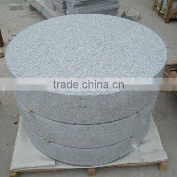 grey round paving stone