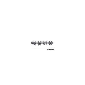 rock arm assembly