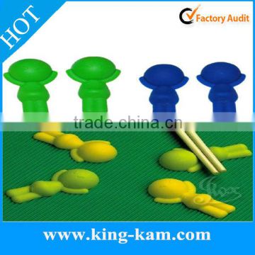 Silicone chopstick rest in kid shape