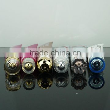 Cosmetic plastic tube container with acrylic cap