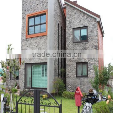 Grey clay wall bricks and old brick for old style building