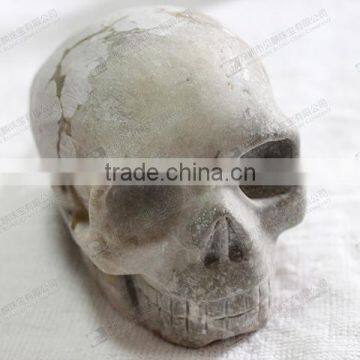 Natural carved stone skull