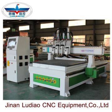 Automatic Three Spindles CNC Router Machine for Wood Cabinet Door Making photo-5