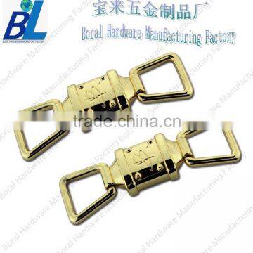 Shiny gold metal buckle for strap bag