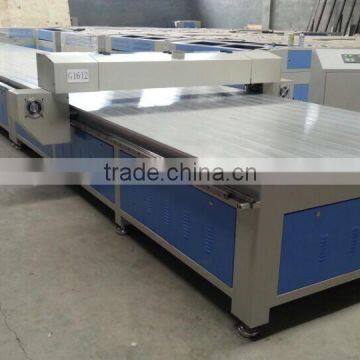 Co2 laser cutting machine for fabric with adsorbed material table