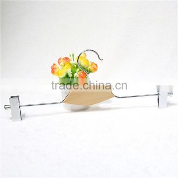 Plywood laminate covered metal pants hanger, pants clips