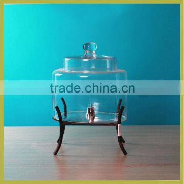 Clear glass drink dispenser with metal stand