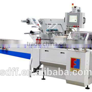 second package flow wrapping machine with box motion end sealer