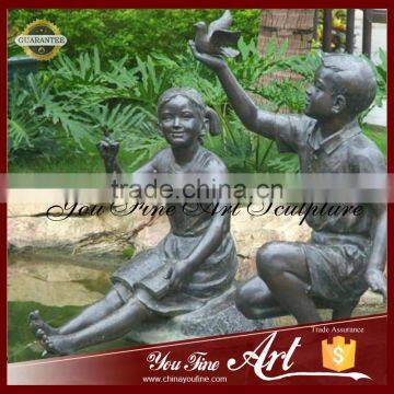 Hot Sale Metal Material Bronze Sitting Children With Bird photo-2