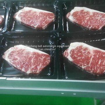 Поставка полностью автоматической вакуумной машины для стикерной упаковки стейков photo-2